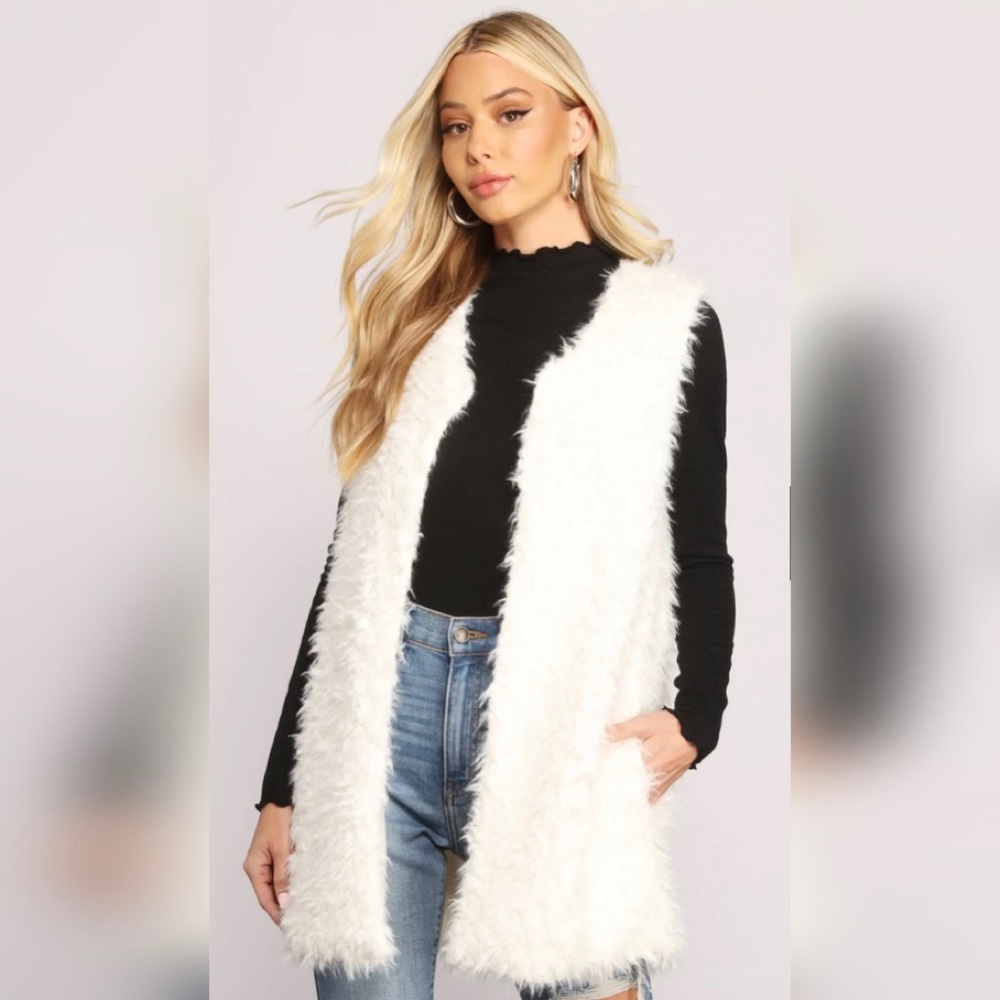 White furry vest